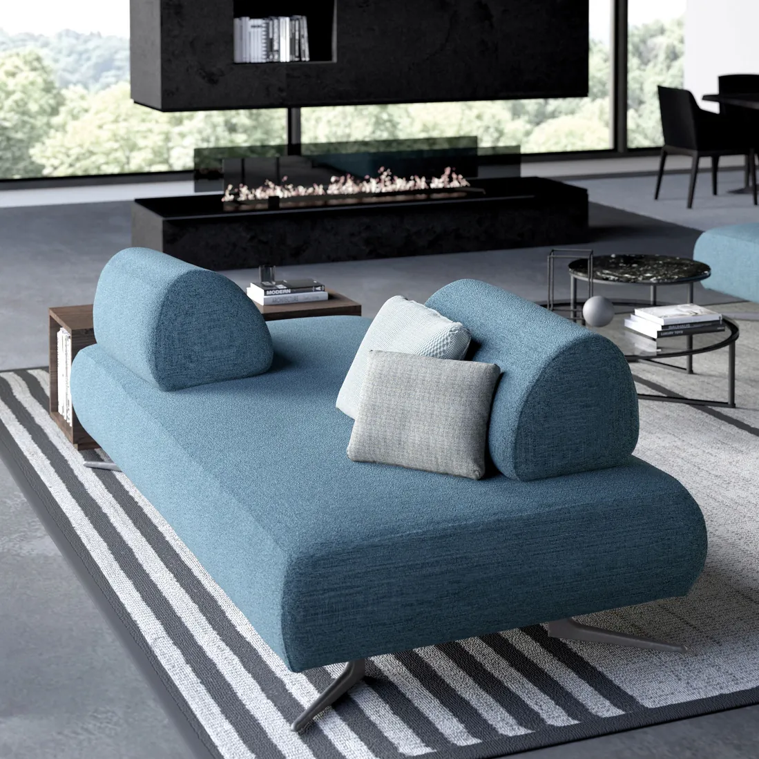Modular daybed in pale blue bouclé on a striped rug